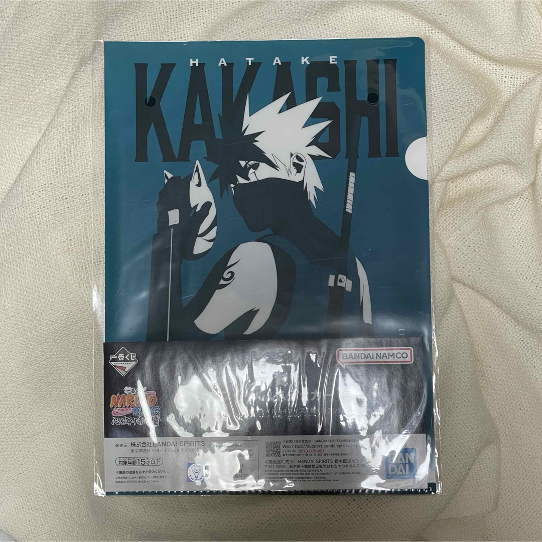 BANDAI NAMCO Entertainment(バンダイナムコエンターテインメント)の一番くじ NARUTO 心を写す赤き瞳 H賞 クリアファイル&ステッカー エンタメ/ホビーのアニメグッズ(クリアファイル)の商品写真