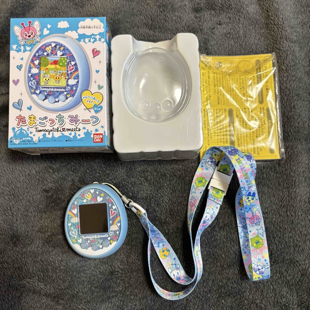たまごっちみーつ メルヘンみーつver. ブルー ネックストラップ付き たまごっちみーつ メルヘンみーつver. ブルー ネックストラップ付き