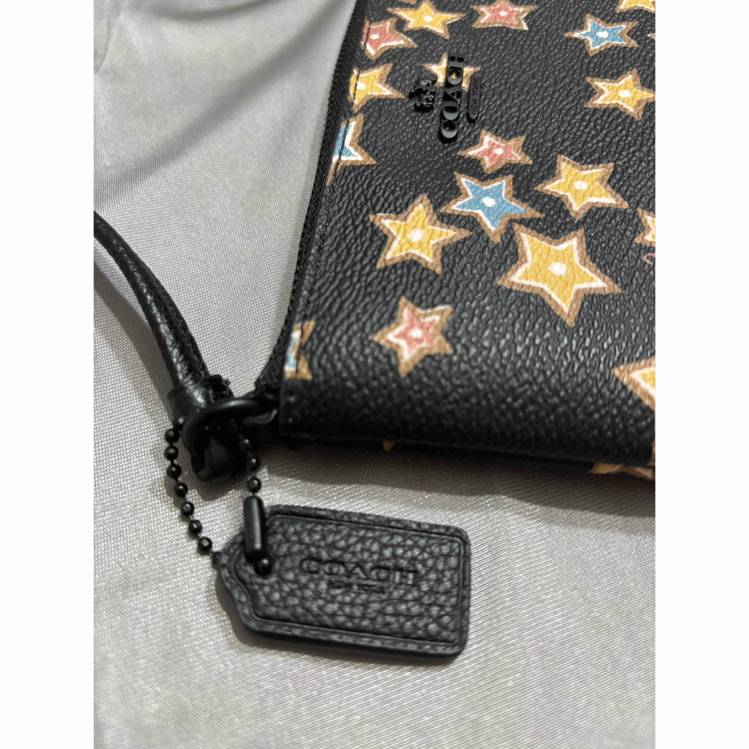 新品】コーチ COACH コーナー ジップ リストレット・スター プリント 新品】コーチ COACH コーナー ジップ リストレット・スター プリント