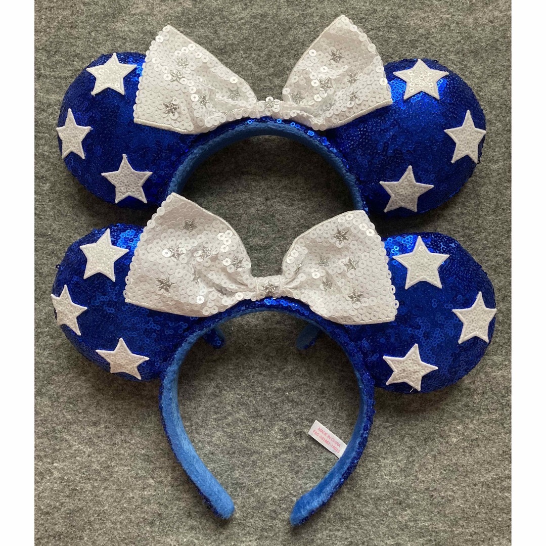 Disney(ディズニー)のディズニー カチューシャ スパンコール 青 星 白 リボン ミニー ブルー ペア レディースのヘアアクセサリー(カチューシャ)の商品写真