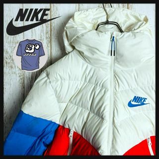 NIKE - NIKE 総柄ダウンジャケット loose fit S 白黒の通販 by NIKE - NIKE 総柄ダウンジャケット loose fit S 白黒の通販 by