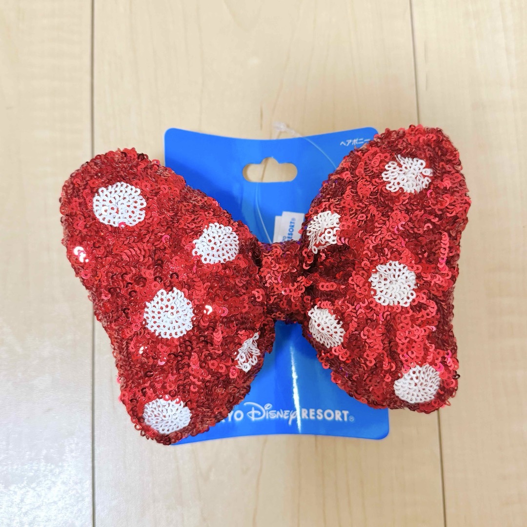 Disney(ディズニー)の【新品/未使用】TDR ディズニーヘアゴム ミニーリボン エンタメ/ホビーのおもちゃ/ぬいぐるみ(キャラクターグッズ)の商品写真
