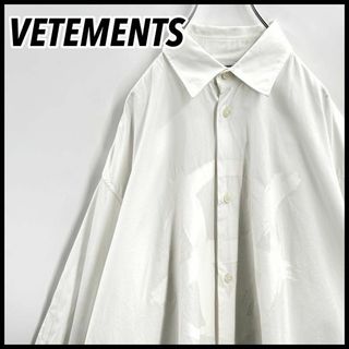 VETEMENTS - VETEMENTS フランネルシャツ 赤黒 ペンキプリントの VETEMENTS - VETEMENTS フランネルシャツ 赤黒 ペンキプリントの
