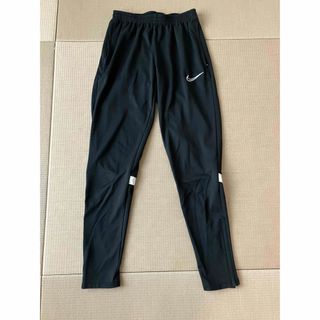 NIKE - NIKE ウーブンパンツ スウォッシュ ナイロンパンツ NIKE - NIKE ウーブンパンツ スウォッシュ ナイロンパンツ
