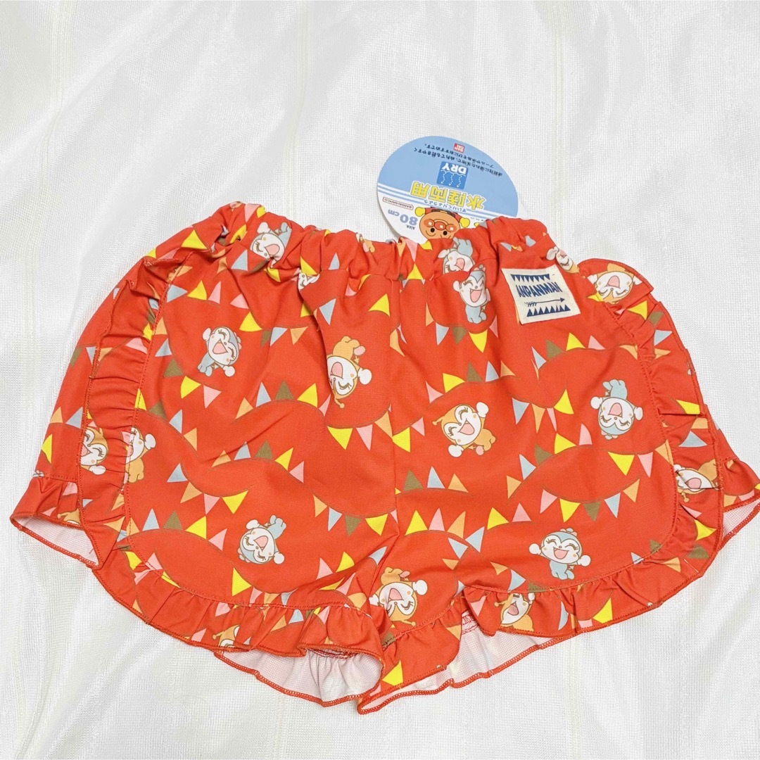 アンパンマン(アンパンマン)の【新品】アンパンマン 水陸両用パンツ 80cm 赤 フリル キッズ/ベビー/マタニティのベビー服(~85cm)(水着)の商品写真