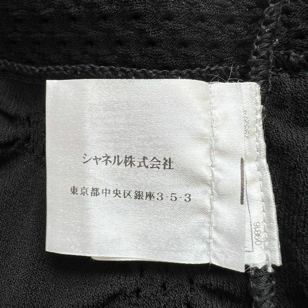 CHANEL - CHANEL 透かし編み ココマークボタン ノースリーブ CHANEL - CHANEL 透かし編み ココマークボタン ノースリーブ