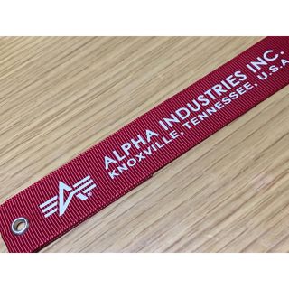 アルファインダストリーズ(ALPHA INDUSTRIES)のアルファインダストリーズ ALPHA INDUSTRIES 赤タグ リボン(その他)