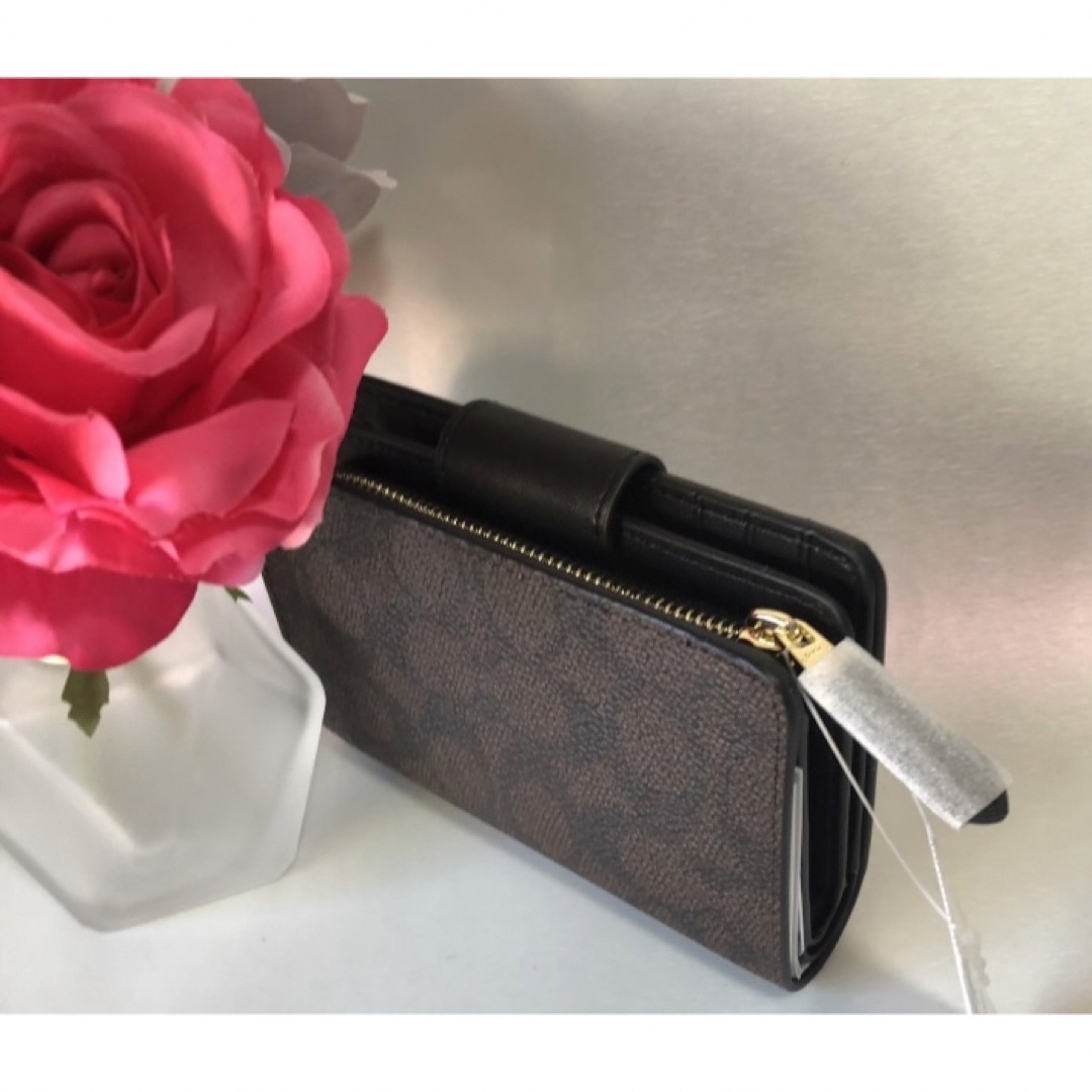 COACH - コーチ二つ折り財布新品ダークブラウンシグネチャーの COACH - コーチ二つ折り財布新品ダークブラウンシグネチャーの