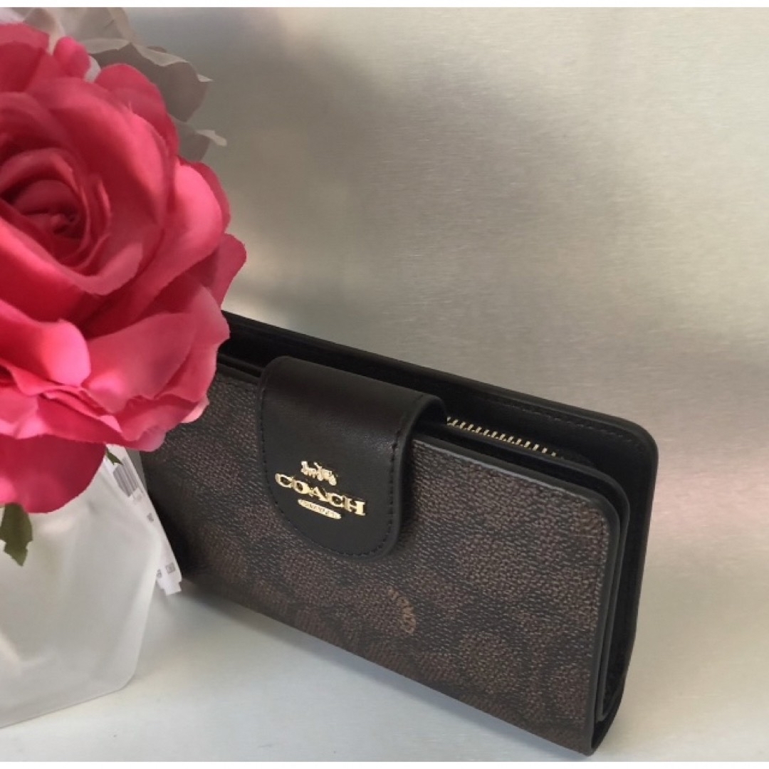 COACH - コーチ二つ折り財布新品ダークブラウンシグネチャーの COACH - コーチ二つ折り財布新品ダークブラウンシグネチャーの