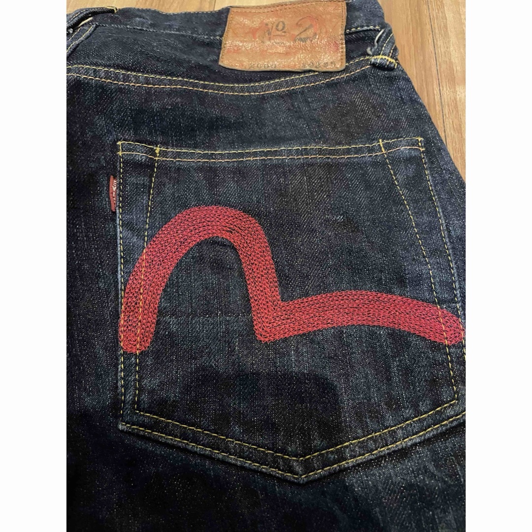 EVISU - サイズ30 赤刺繍 スイカ耳 2000 NO2 エヴィス エビスの EVISU - サイズ30 赤刺繍 スイカ耳 2000 NO2 エヴィス エビスの