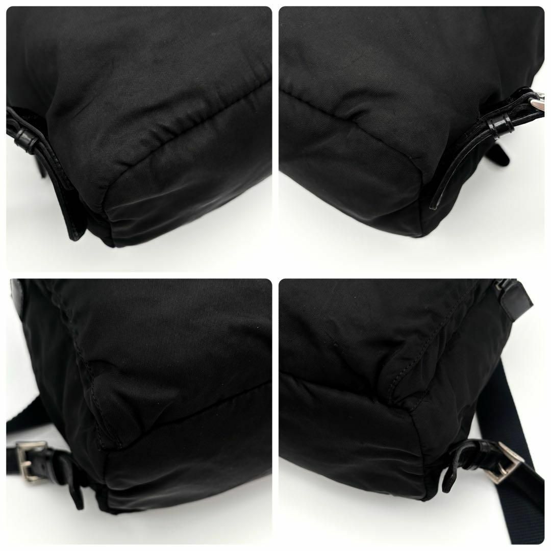 PRADA - プラダ リュック 三角ロゴ 巾着 フラップ ブラック PRADA - プラダ リュック 三角ロゴ 巾着 フラップ ブラック
