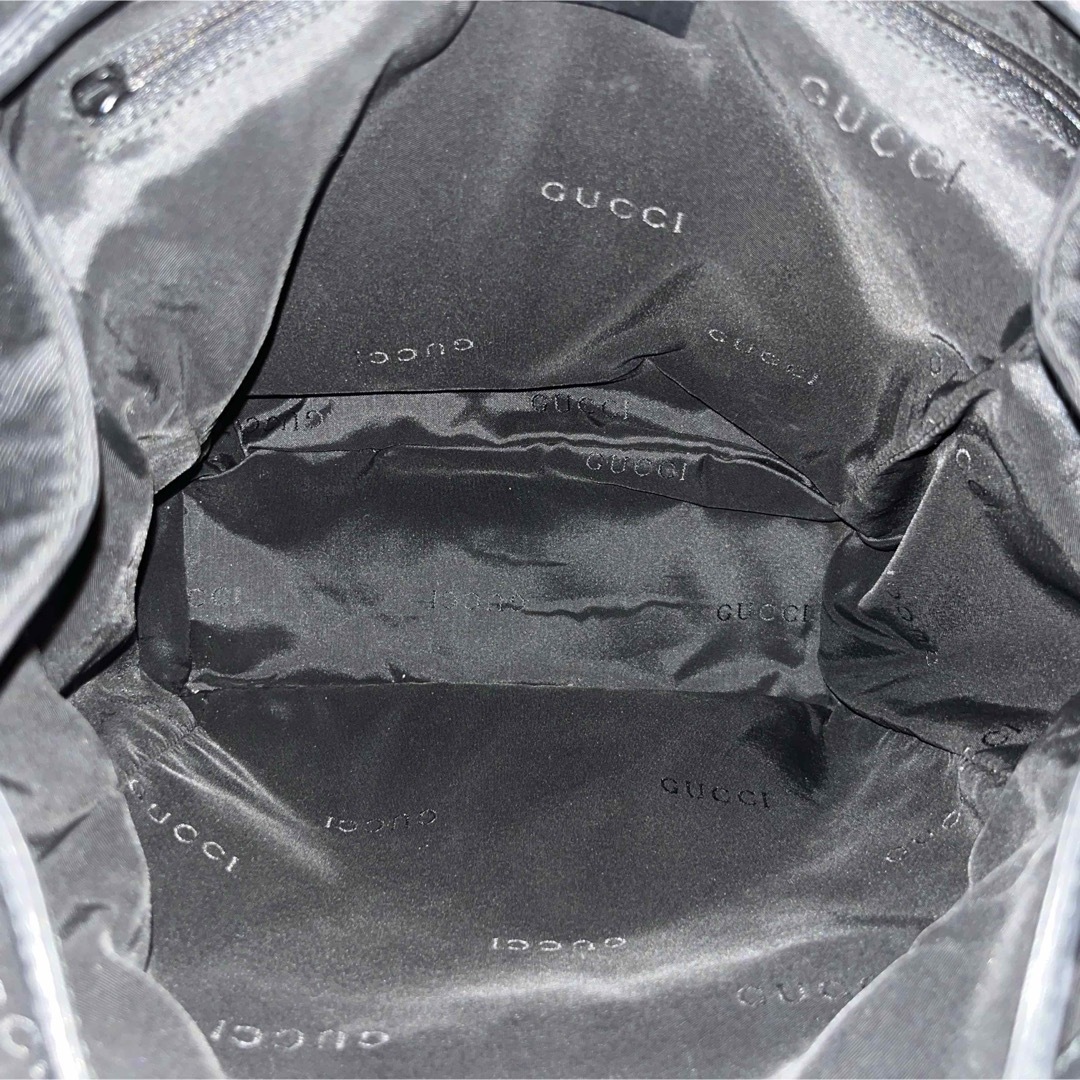 GUCCI - 良品 グッチ リュック 巾着 ロゴ型押し バックパック GUCCI - 良品 グッチ リュック 巾着 ロゴ型押し バックパック