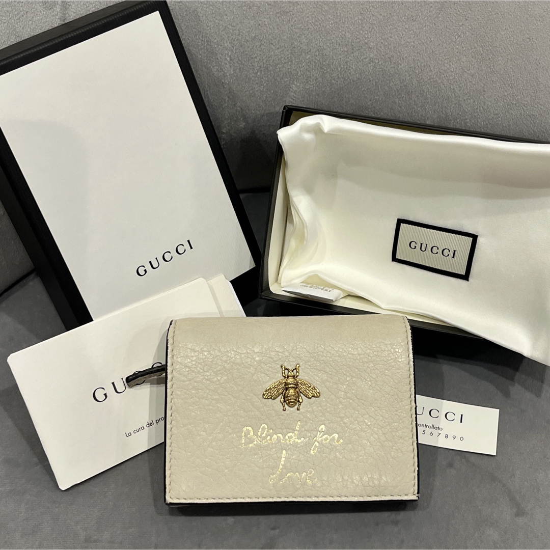 GUCCI - GUCCI 二つ折り財布 アイボリー 蜂刺繍の通販 by GUCCI - GUCCI 二つ折り財布 アイボリー 蜂刺繍の通販 by