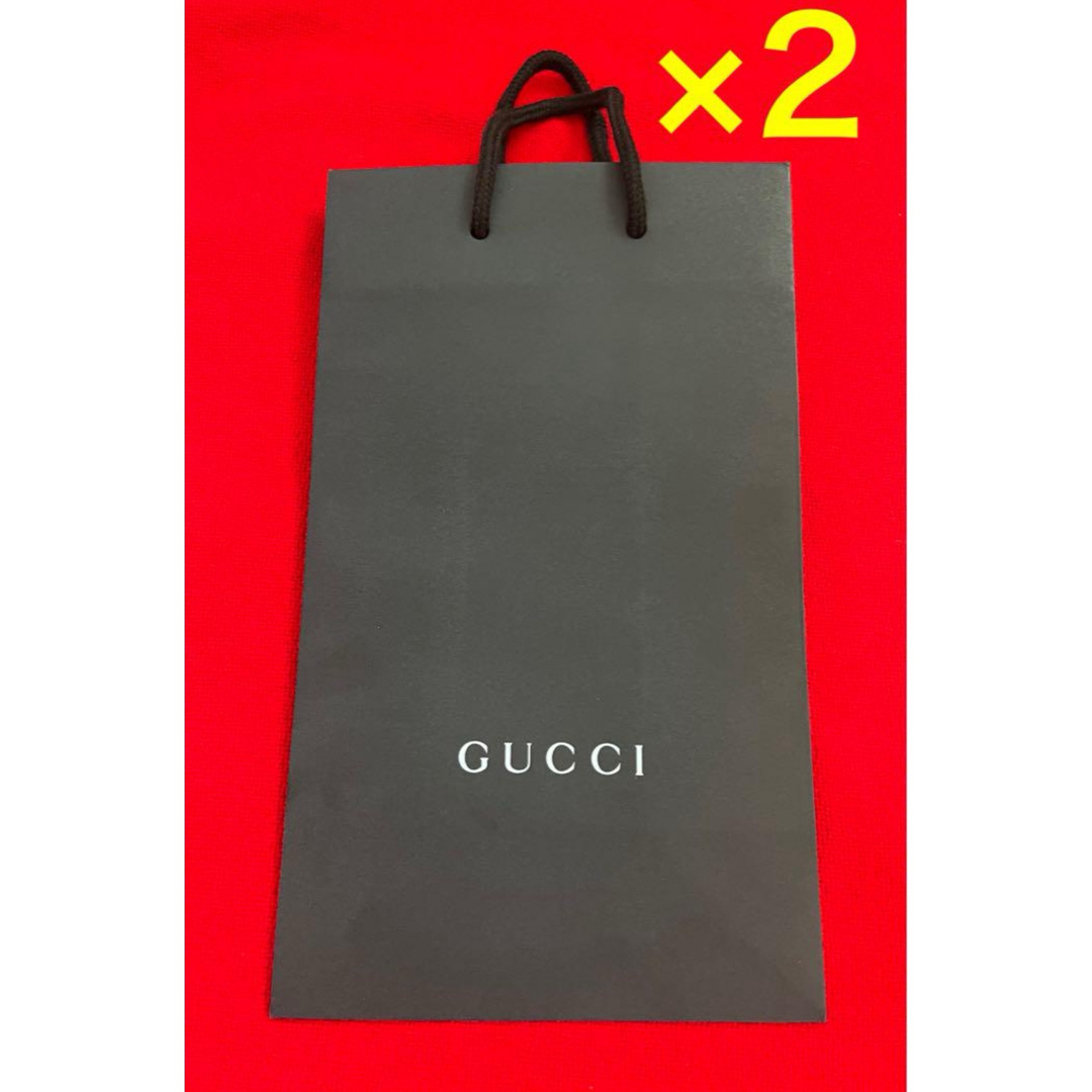GUCCI - 新品.本物】 GUCCI グッチ 紙袋 ショップ袋 黒 2枚の GUCCI - 新品.本物】 GUCCI グッチ 紙袋 ショップ袋 黒 2枚の