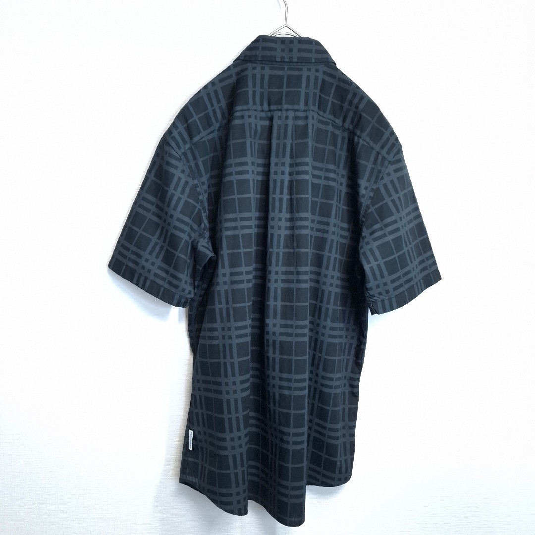 BURBERRY - 【美品】BURBERRY BLUE LABEL 黒 チェック柄 半袖 BURBERRY - 【美品】BURBERRY BLUE LABEL 黒 チェック柄 半袖