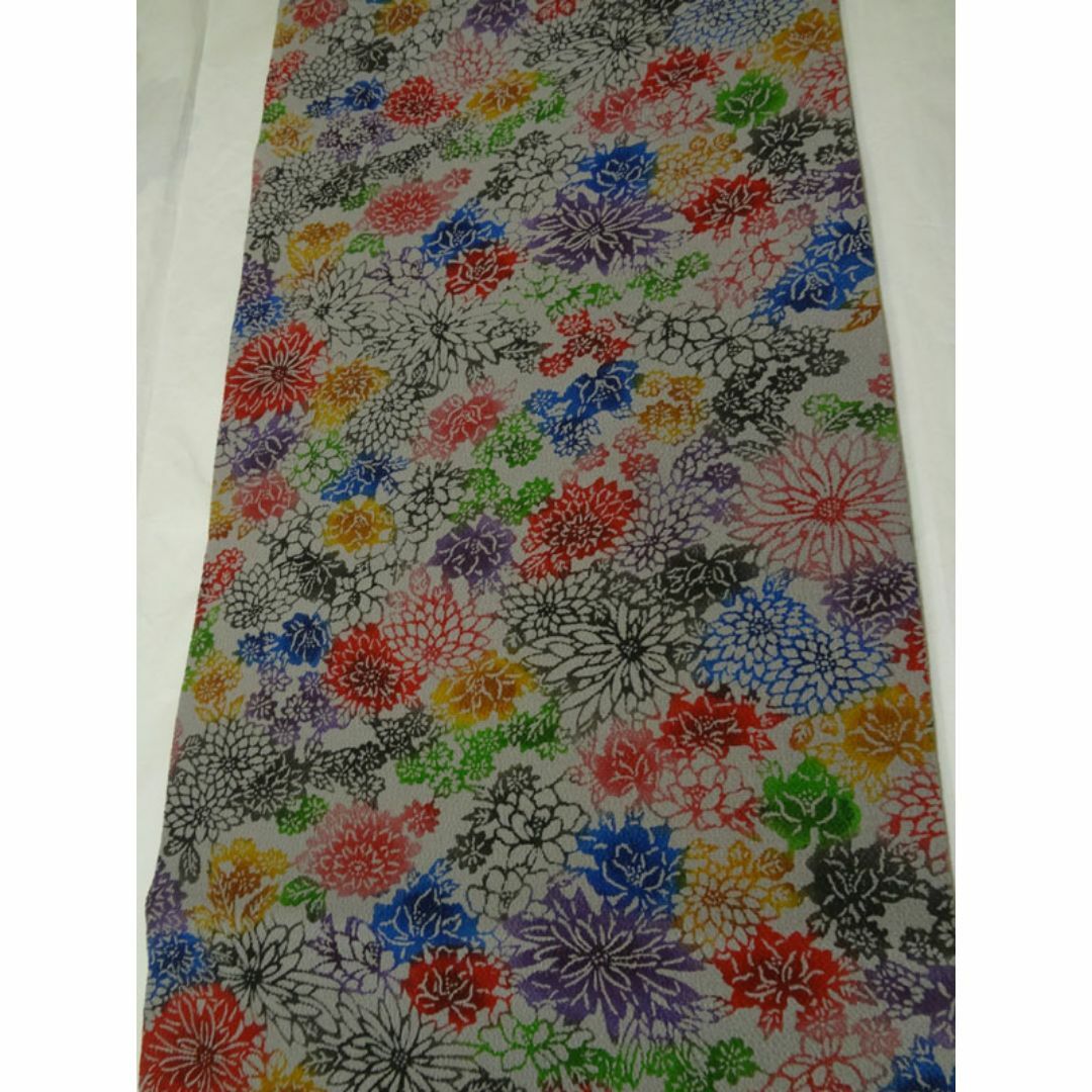 薄い灰色に菊や牡丹 紅型調 名古屋帯