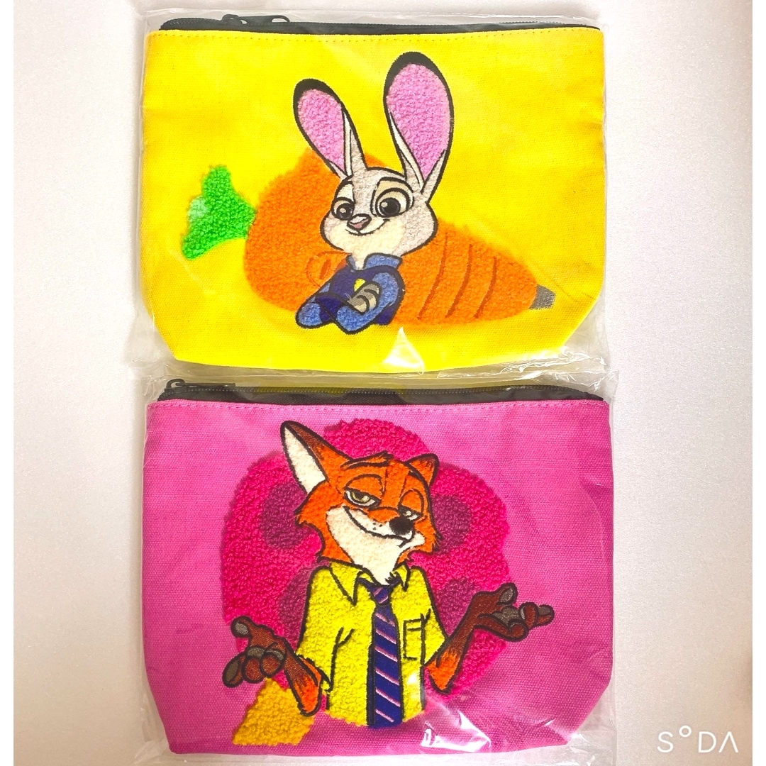 Disney(ディズニー)のズートピア Happyくじ C賞 サガラ刺繍ポーチ ニック ピンク ジュディ エンタメ/ホビーのおもちゃ/ぬいぐるみ(キャラクターグッズ)の商品写真