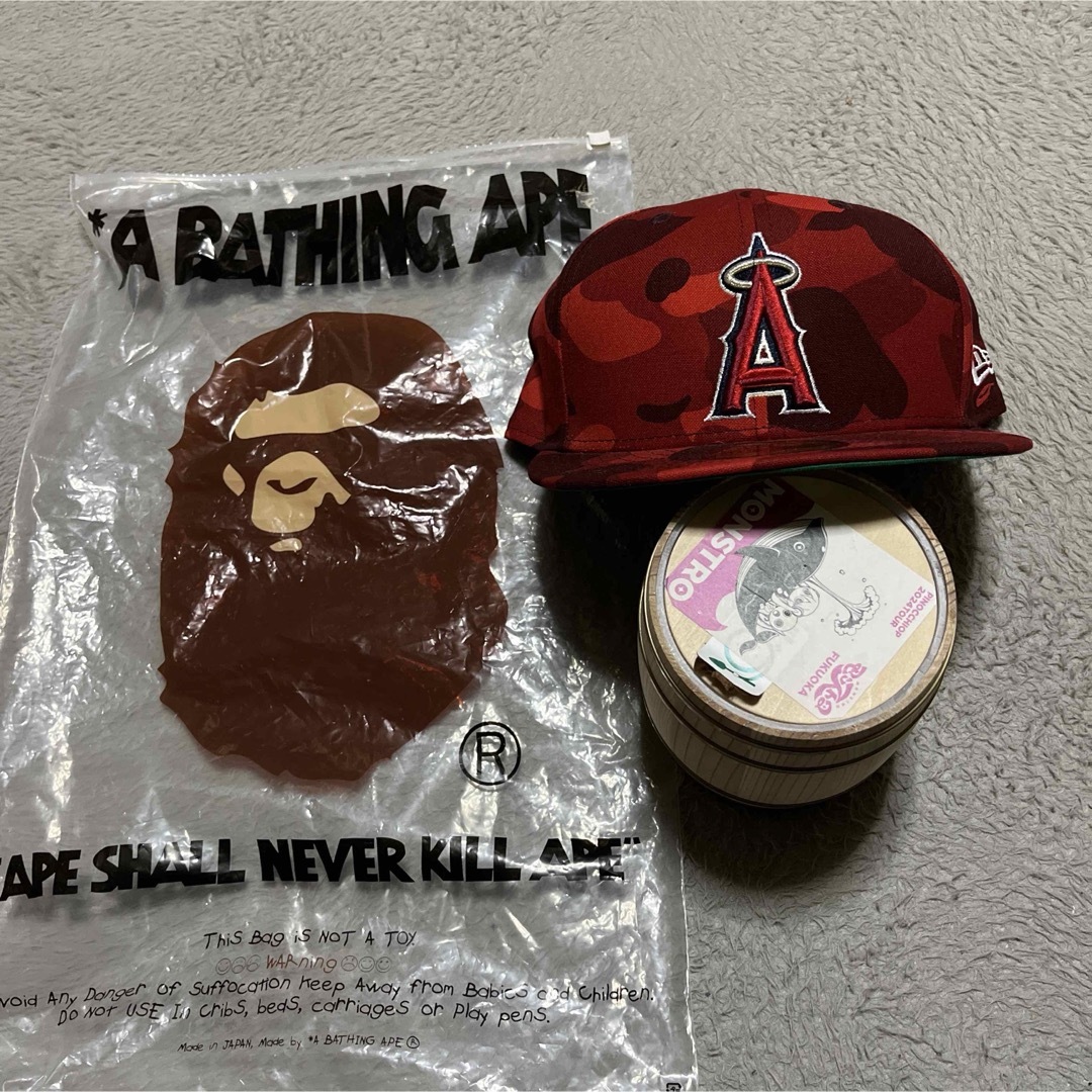 A BATHING APE - APE BAPE KAWS MLB ANGELS NEW ERA キャップの A BATHING APE - APE BAPE KAWS MLB ANGELS NEW ERA キャップの