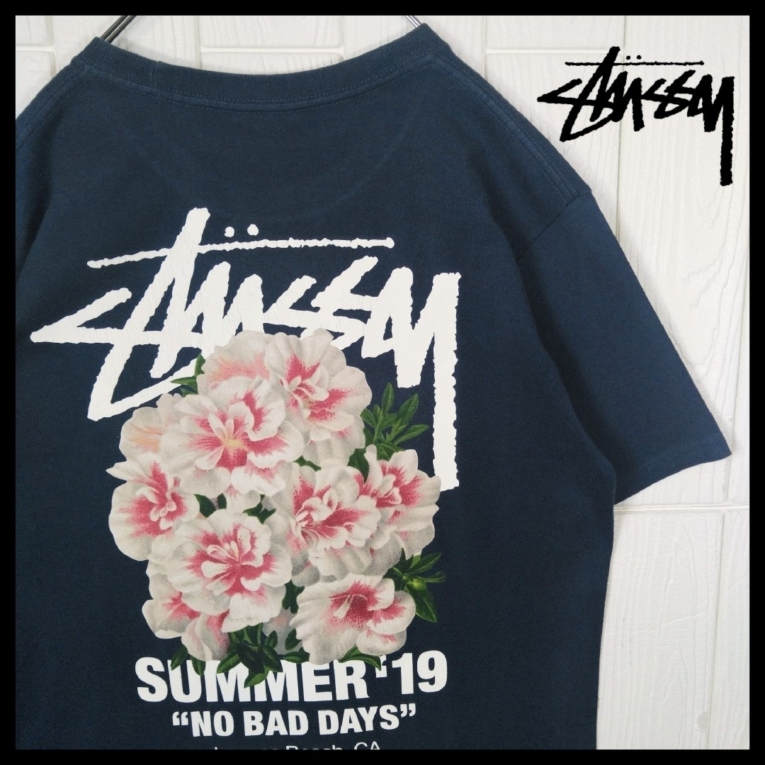 STUSSY - 【STUSSY】フラワーデザイン Tシャツ ネイビーの通販 STUSSY - 【STUSSY】フラワーデザイン Tシャツ ネイビーの通販