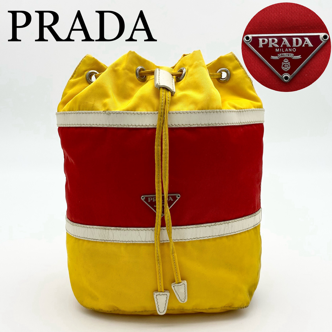 PRADA - PRADA 巾着ポーチ 三角ロゴ ナイロン テスート レザー PRADA - PRADA 巾着ポーチ 三角ロゴ ナイロン テスート レザー