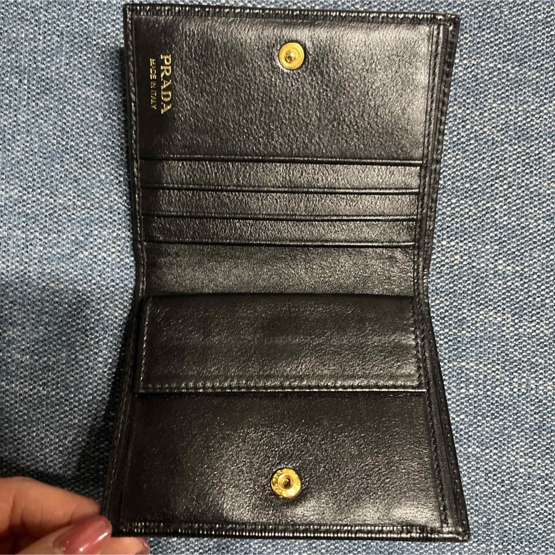PRADA - 【美品】PRADA ブラック レザー 二つ折り財布の通販 by PRADA - 【美品】PRADA ブラック レザー 二つ折り財布の通販 by