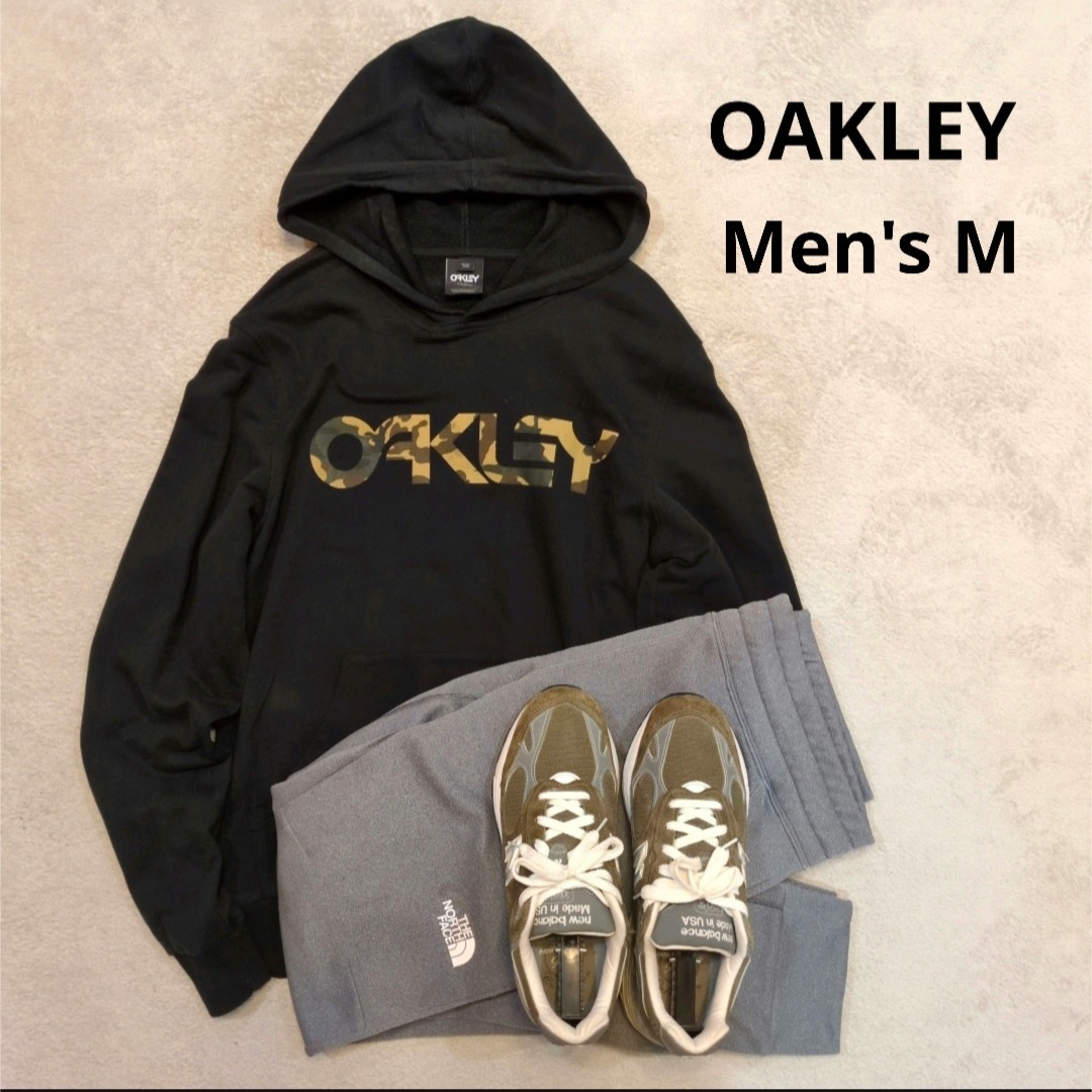 Oakley - オークリー 迷彩ロゴ フーディー パーカー 黒 ブラック Oakley - オークリー 迷彩ロゴ フーディー パーカー 黒 ブラック