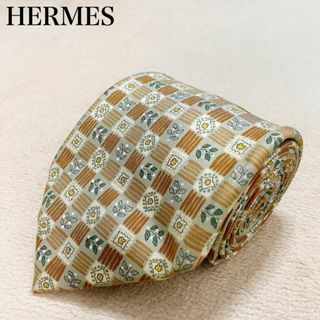 HERMES - エルメス ネクタイ 花柄 幾何学 ベージュ シルク 高級 HERMES - エルメス ネクタイ 花柄 幾何学 ベージュ シルク 高級