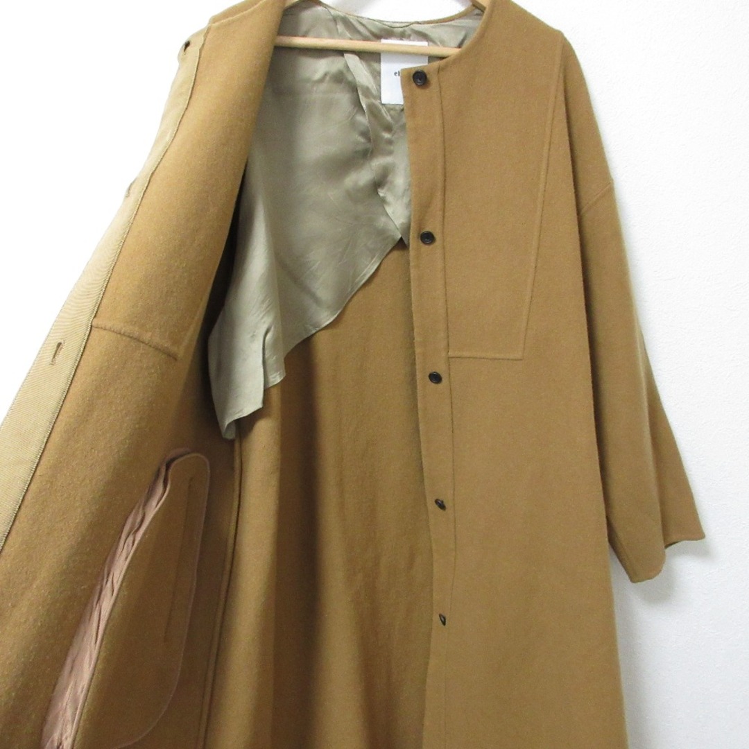 ebure - 美品 ebure エブール ウール 比翼ボタン サイドスリット ebure - 美品 ebure エブール ウール 比翼ボタン サイドスリット