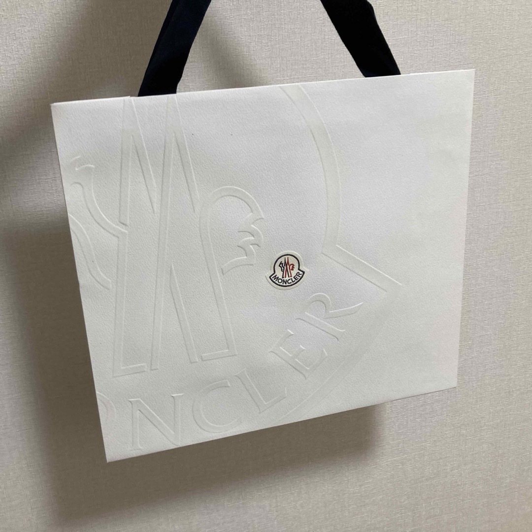 MONCLER - 新品未使用 モンクレール WETE 黒 ハンガー付の通販 MONCLER - 新品未使用 モンクレール WETE 黒 ハンガー付の通販