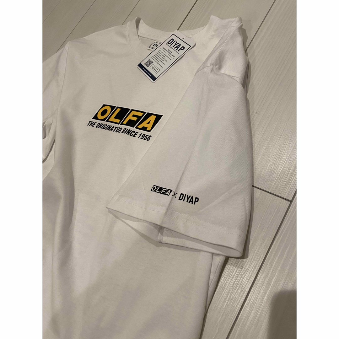 OLFA(オルファ)のDIYAP × OLFA コラボTシャツ ホワイト LL未使用 メンズのトップス(Tシャツ/カットソー(半袖/袖なし))の商品写真