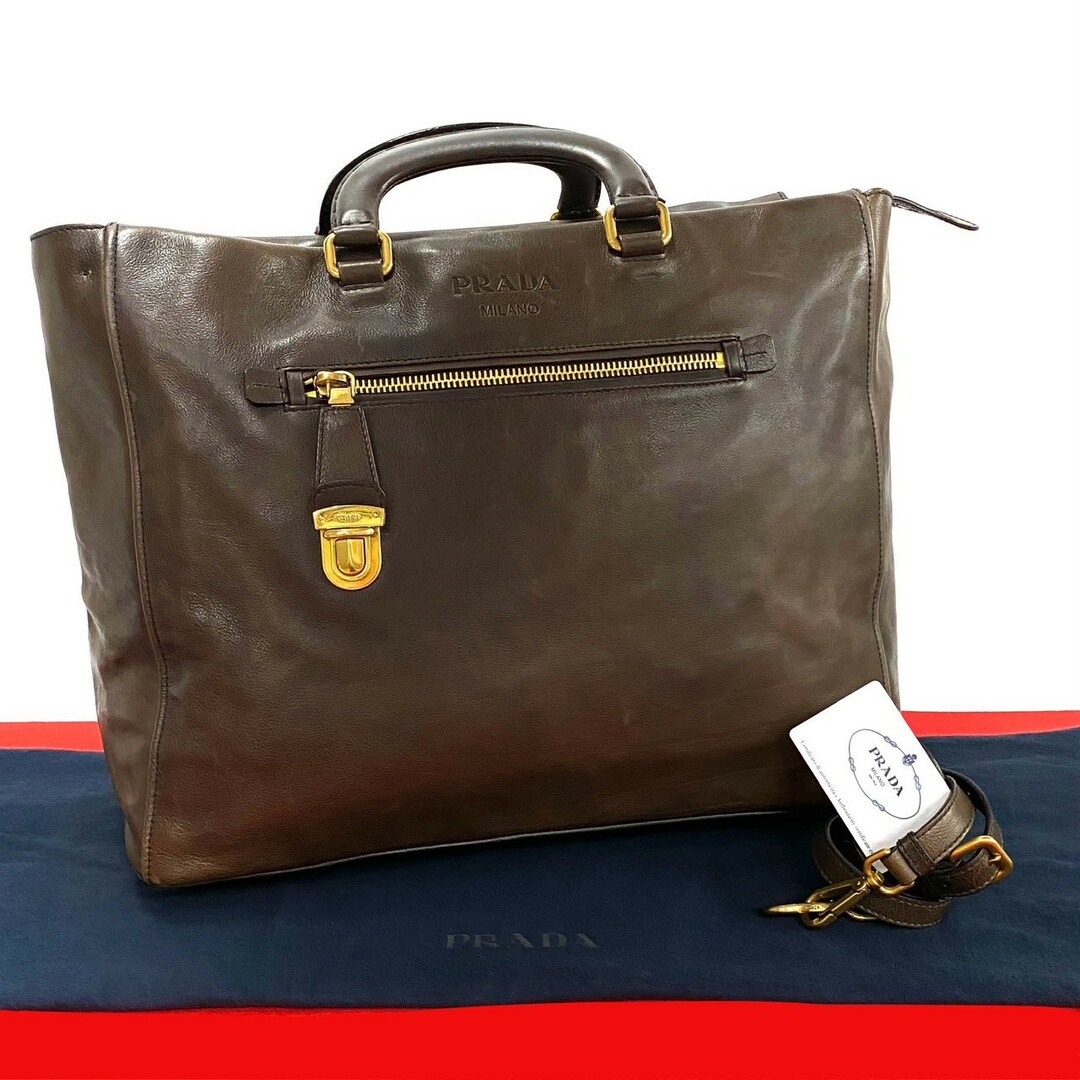 PRADA - 極 美品 袋付き 希少品 PRADA プラダ ロゴ 金具 レザー PRADA - 極 美品 袋付き 希少品 PRADA プラダ ロゴ 金具 レザー