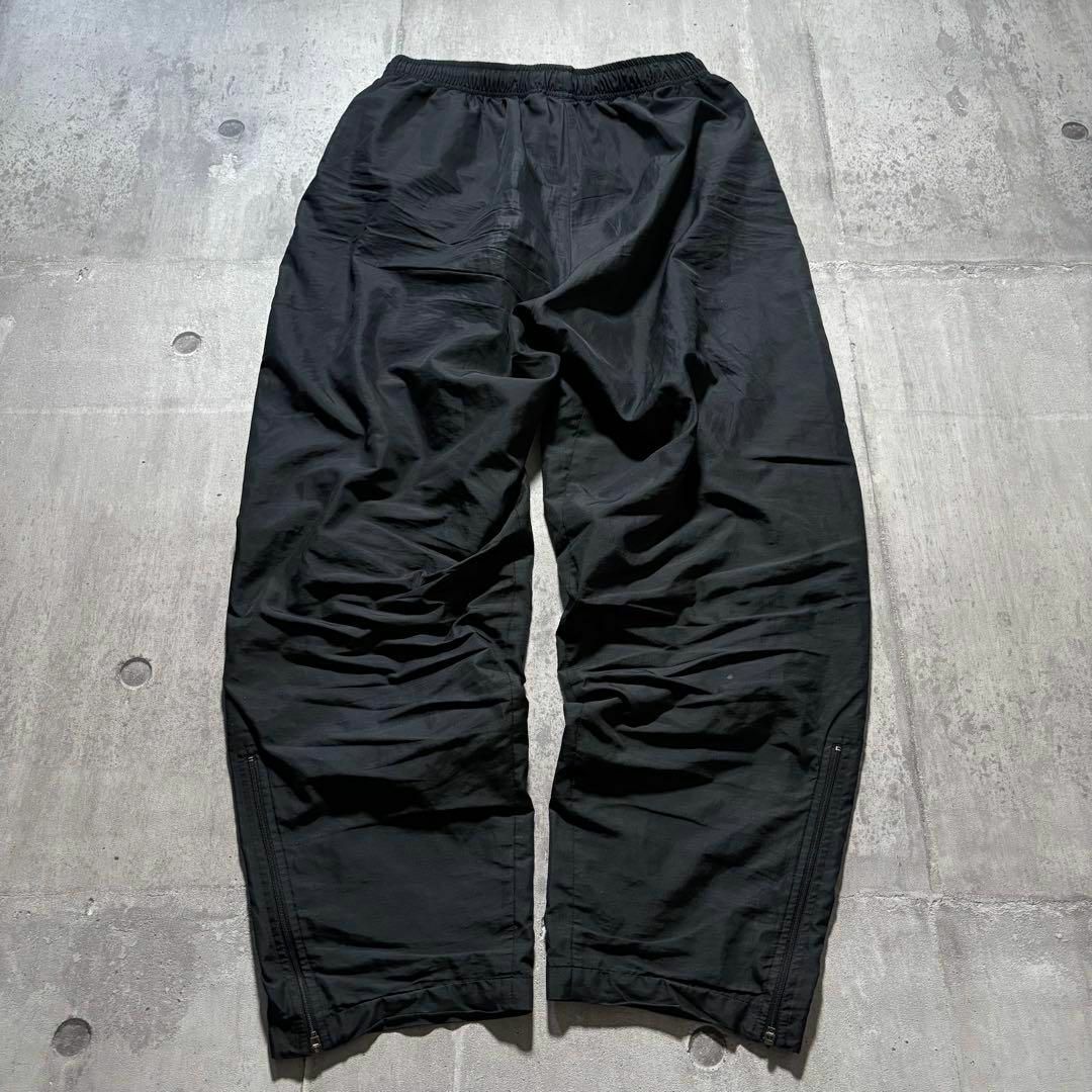 NIKE - y2k NIKE ナイロントラックパンツ サイドライン 裾ジップ NIKE - y2k NIKE ナイロントラックパンツ サイドライン 裾ジップ