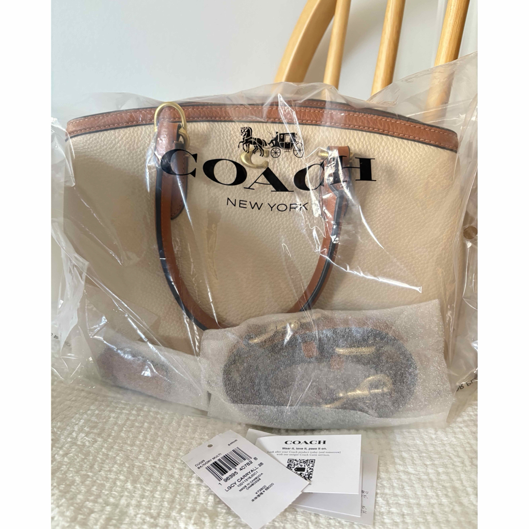 COACH - 新品 COACH コーチ レガシーキャリーオール28の通販 by COACH - 新品 COACH コーチ レガシーキャリーオール28の通販 by