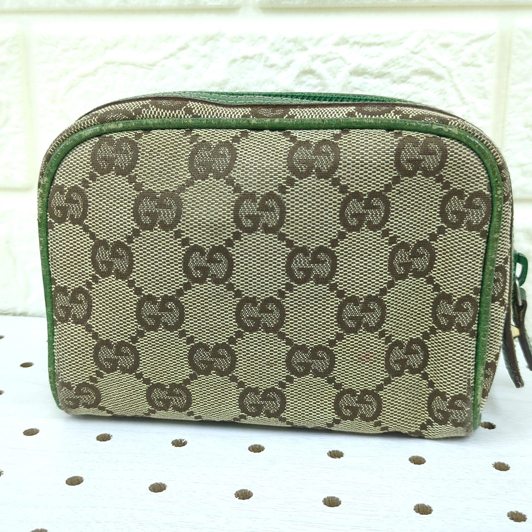 GUCCI - GUCCI グッチ GG柄 キャンバス レザー ポーチ ブラウン GUCCI - GUCCI グッチ GG柄 キャンバス レザー ポーチ ブラウン