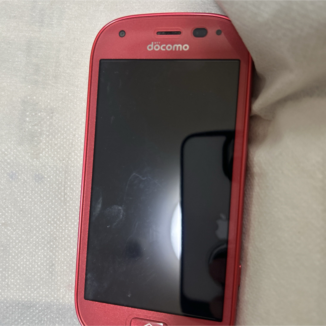 docomo らくらくスマートフォン 本体・ 充電アダプタケース付 の docomo らくらくスマートフォン 本体・ 充電アダプタケース付 の