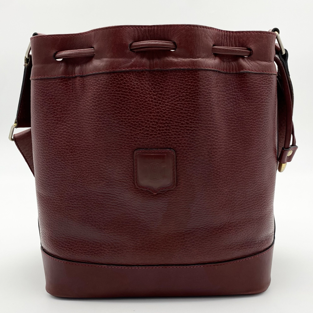CELINE - CELINE 巾着バッグ トリオンフ型押し ボルドー レザー CELINE - CELINE 巾着バッグ トリオンフ型押し ボルドー レザー