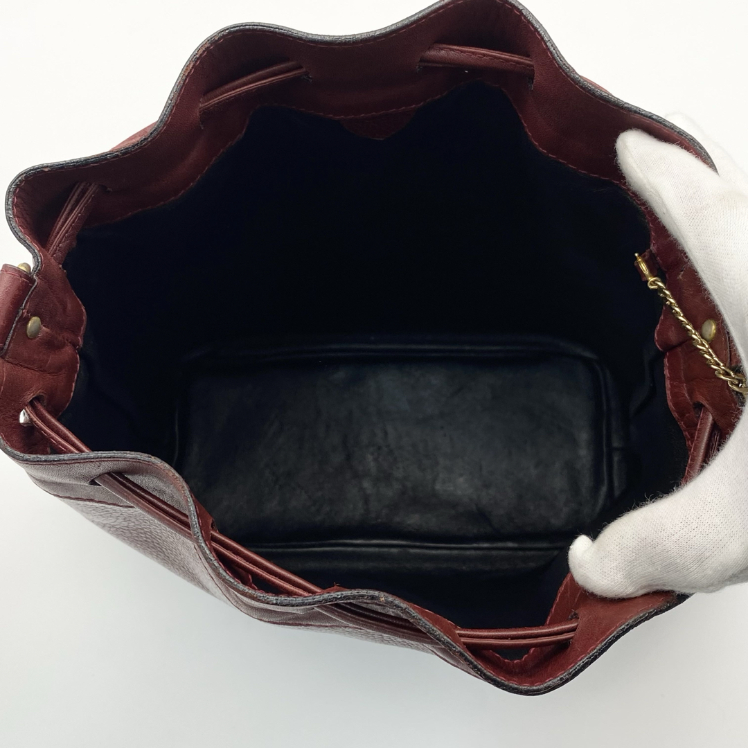 CELINE - CELINE 巾着バッグ トリオンフ型押し ボルドー レザー CELINE - CELINE 巾着バッグ トリオンフ型押し ボルドー レザー