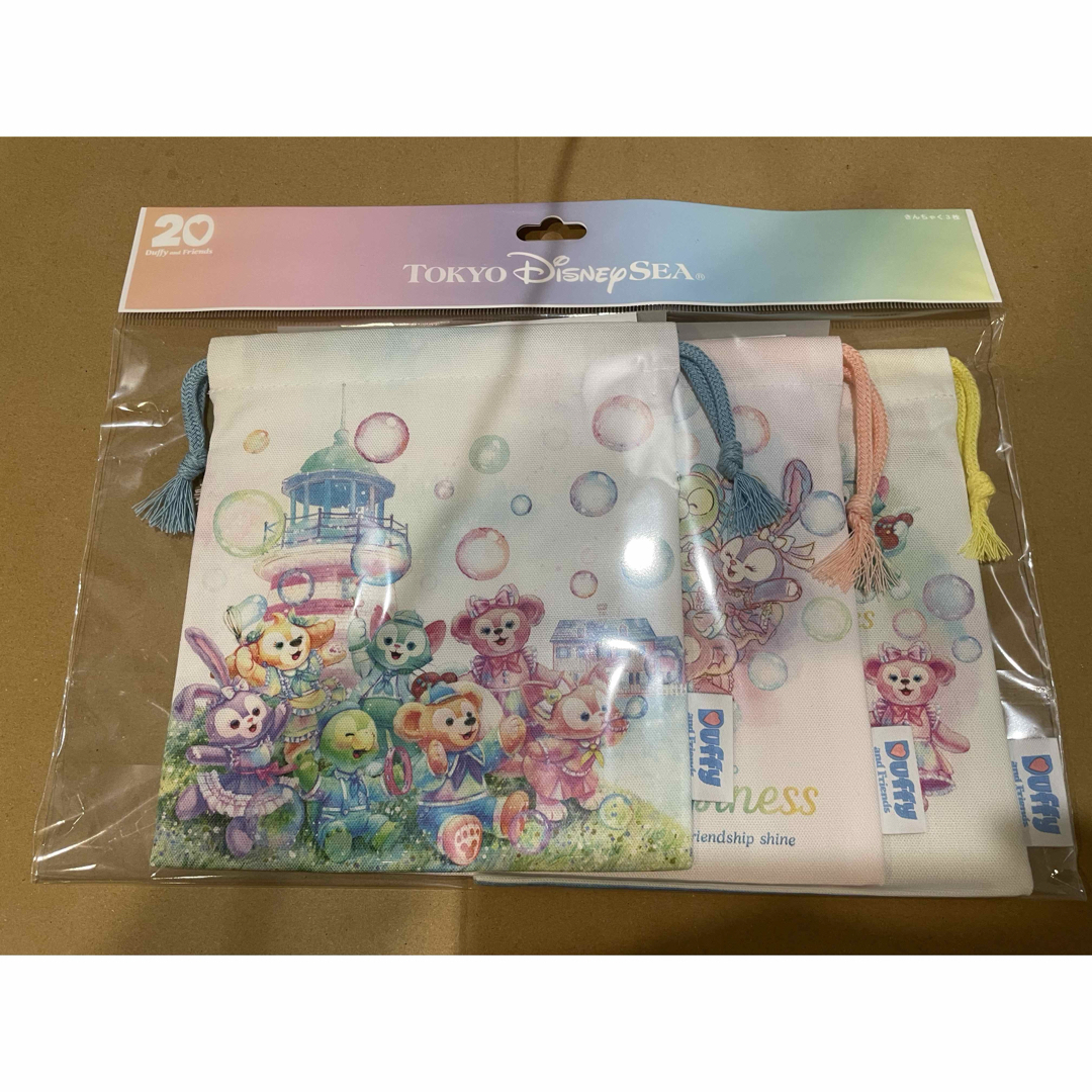 ダッフィー(ダッフィー)のダッフィー カラフルハピネス 巾着 エンタメ/ホビーのおもちゃ/ぬいぐるみ(キャラクターグッズ)の商品写真
