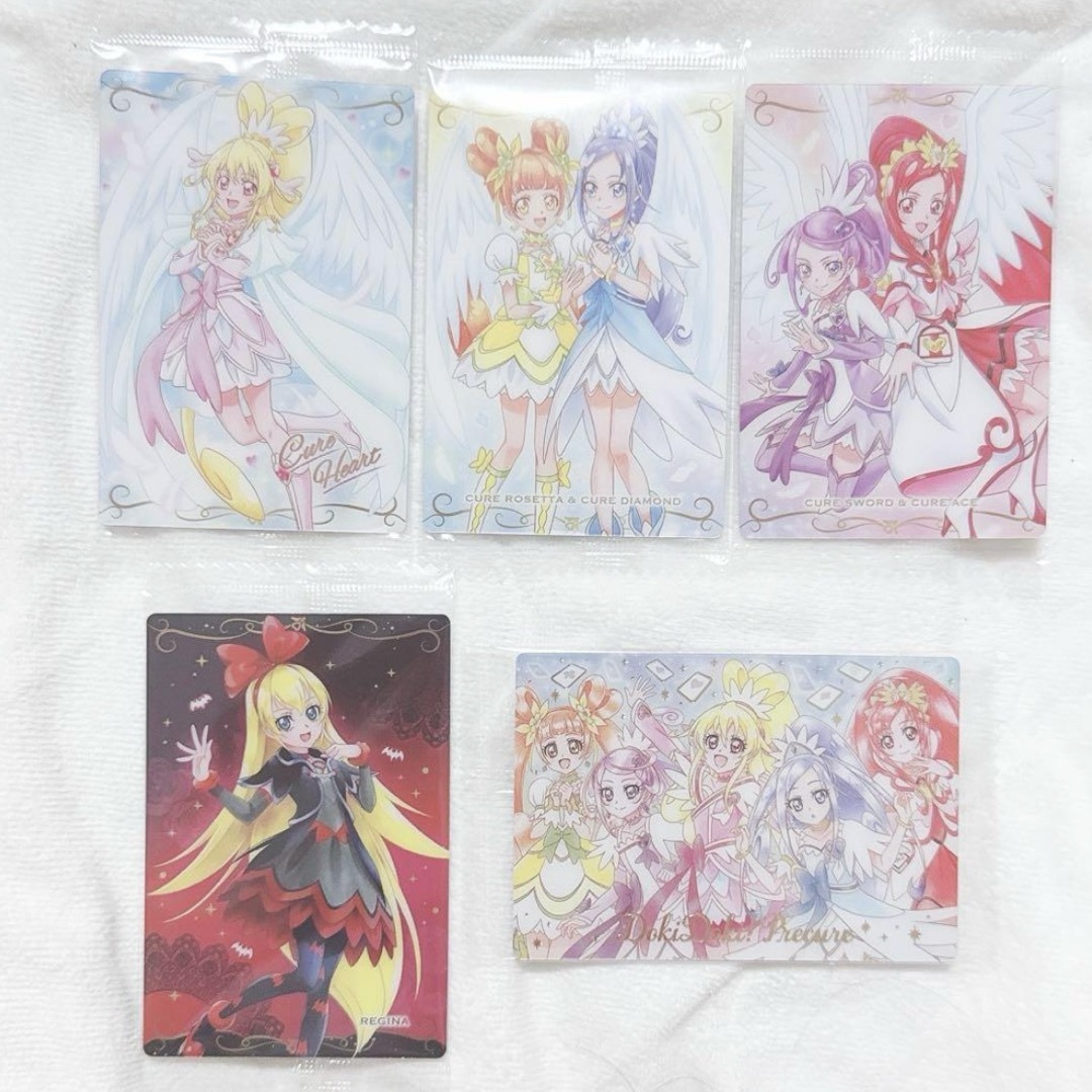 プリキュアウエハース10 ドキドキプリキュア 5枚 キュアハート レジーナ エンタメ/ホビーのおもちゃ/ぬいぐるみ(キャラクターグッズ)の商品写真