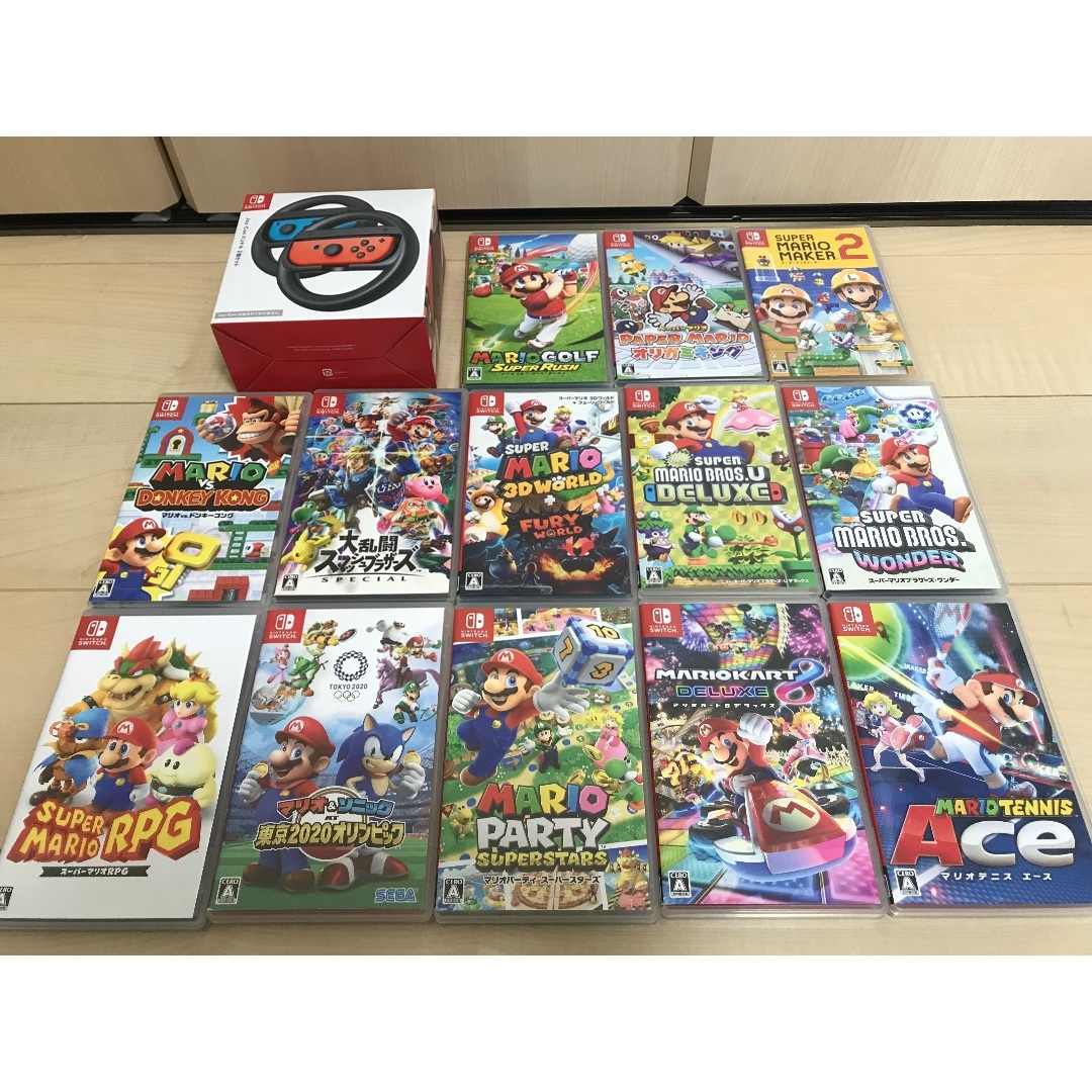 Nintendo Switch(ニンテンドースイッチ)の✨美品有機ELスプラトゥーンモデルSwitch本体一式＋マリオソフト13本付✨ エンタメ/ホビーのゲームソフト/ゲーム機本体(家庭用ゲーム機本体)の商品写真