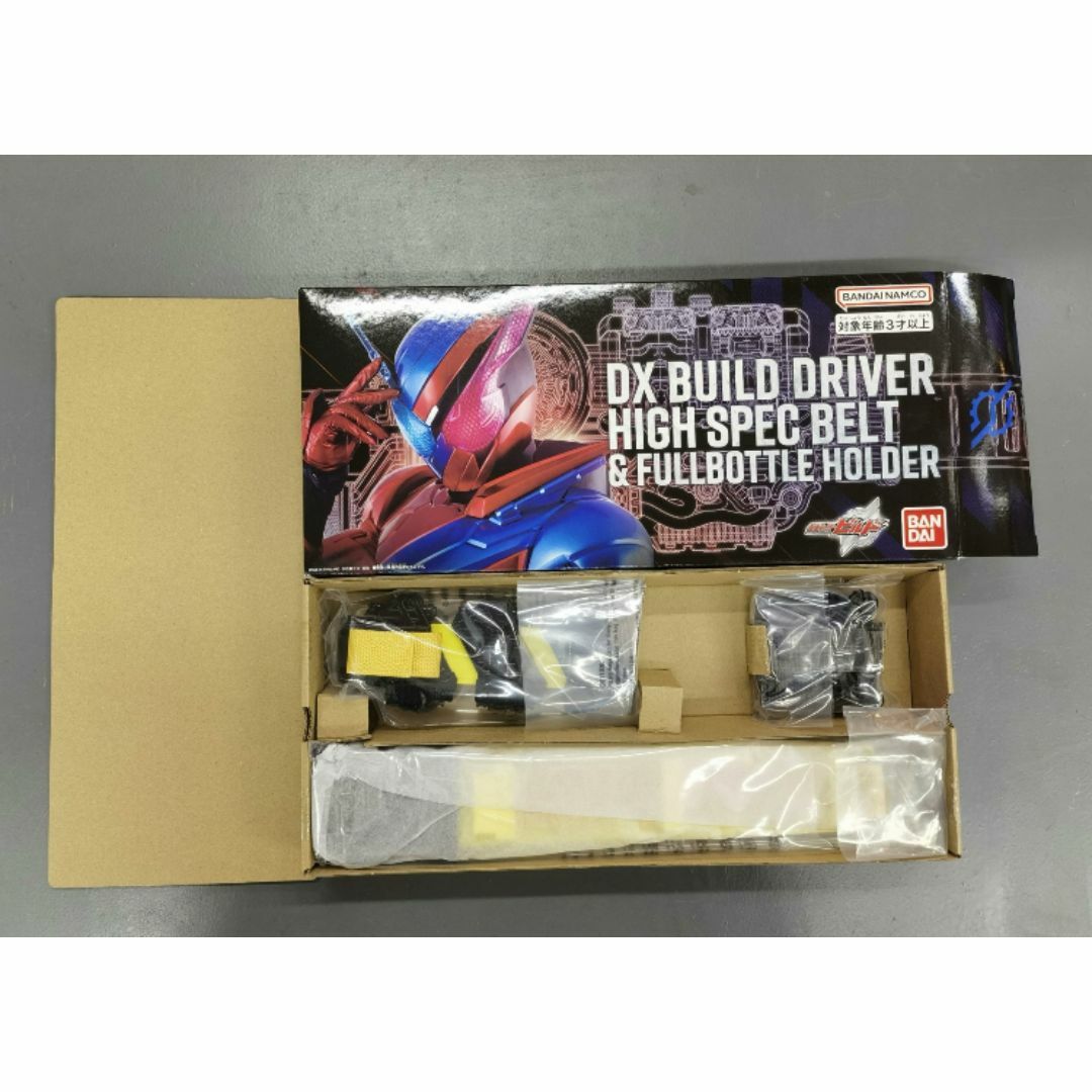 BANDAI(バンダイ)の新品 DXビルドドライバー ハイスペックベルト&フルボトルホルダー エンタメ/ホビーのおもちゃ/ぬいぐるみ(キャラクターグッズ)の商品写真