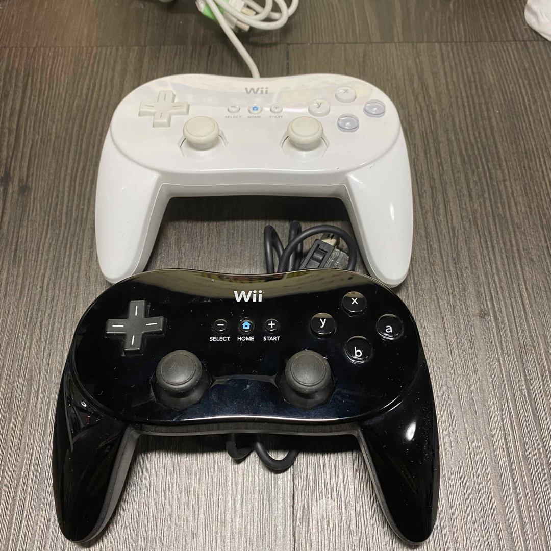 匿名配送 送料無料 任天堂純正 wiiクラシックコントローラー 2個セット エンタメ/ホビーのゲームソフト/ゲーム機本体(家庭用ゲーム機本体)の商品写真