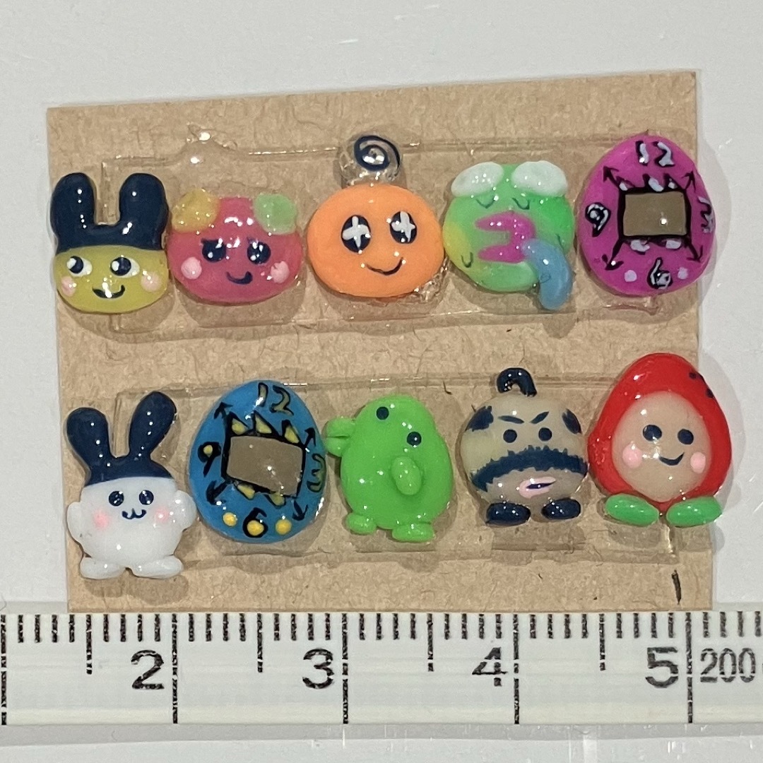 BANDAI(バンダイ)の① ネイルパーツ たまごっち コスメ/美容のネイル(デコパーツ)の商品写真