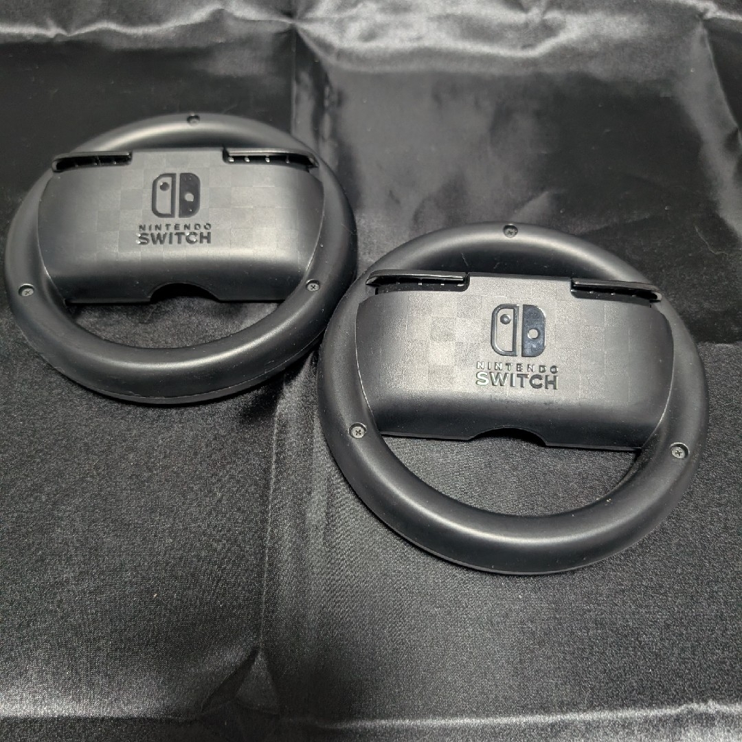 Nintendo Switch(ニンテンドースイッチ)のNintendo純正 Joy-Conハンドル 2個セット エンタメ/ホビーのゲームソフト/ゲーム機本体(その他)の商品写真