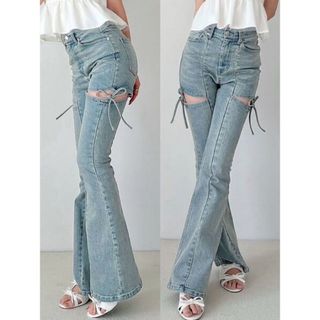 リゼクシー(RESEXXY)のカットアウトリボンデニムパンツ　S(デニム/ジーンズ)