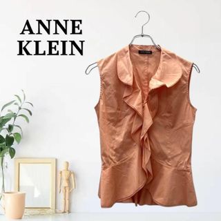アンクライン(ANNE KLEIN)のgm535【M】アンクライン マーメイドペプラム シャーリングギャザー 変形裁ち(シャツ/ブラウス(半袖/袖なし))