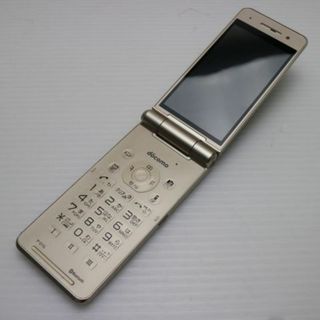 パナソニック(Panasonic)のP-01G ゴールド 白ロム M000(携帯電話本体)
