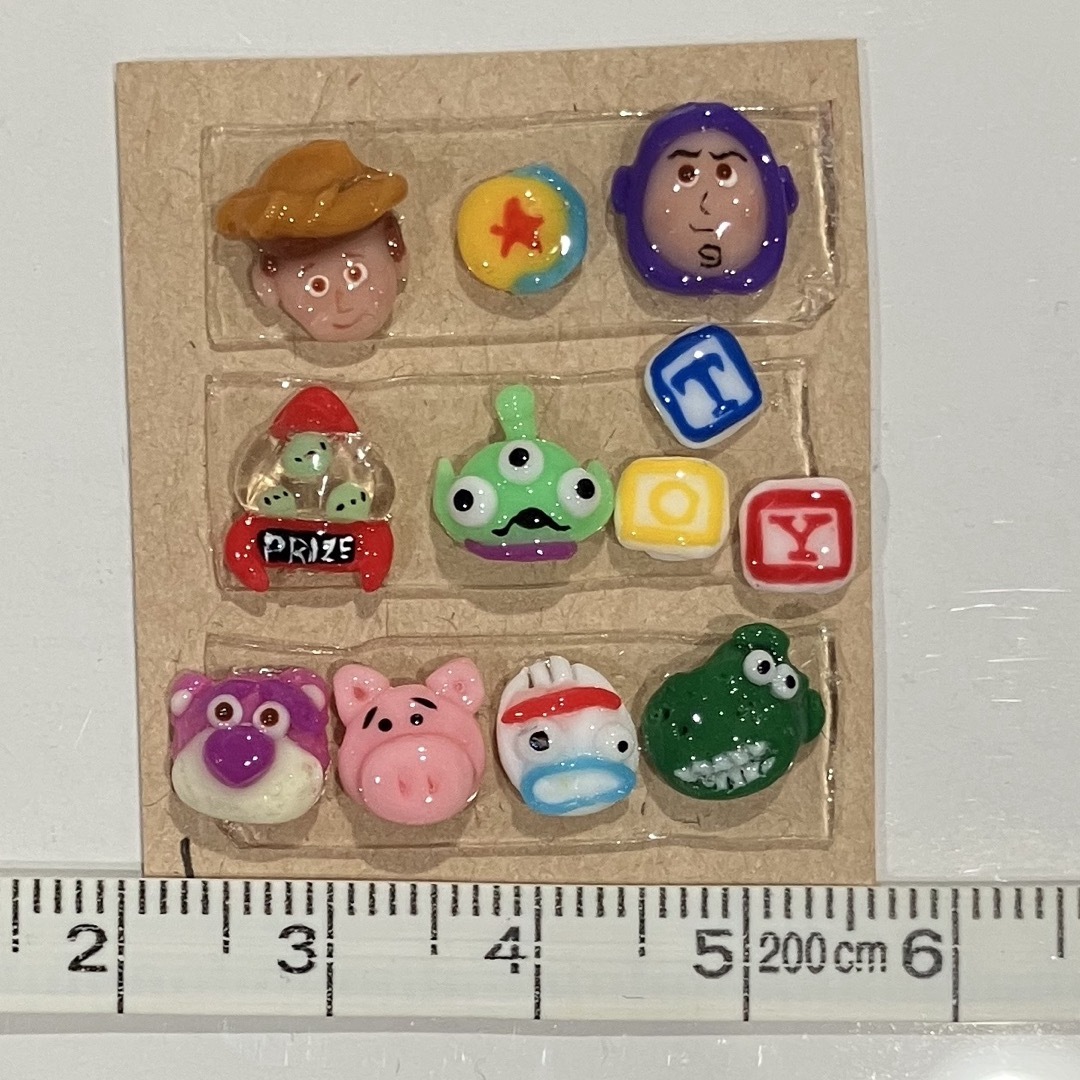 Disney(ディズニー)の① ネイルパーツ トイストーリー ウッディ バズ コスメ/美容のネイル(デコパーツ)の商品写真