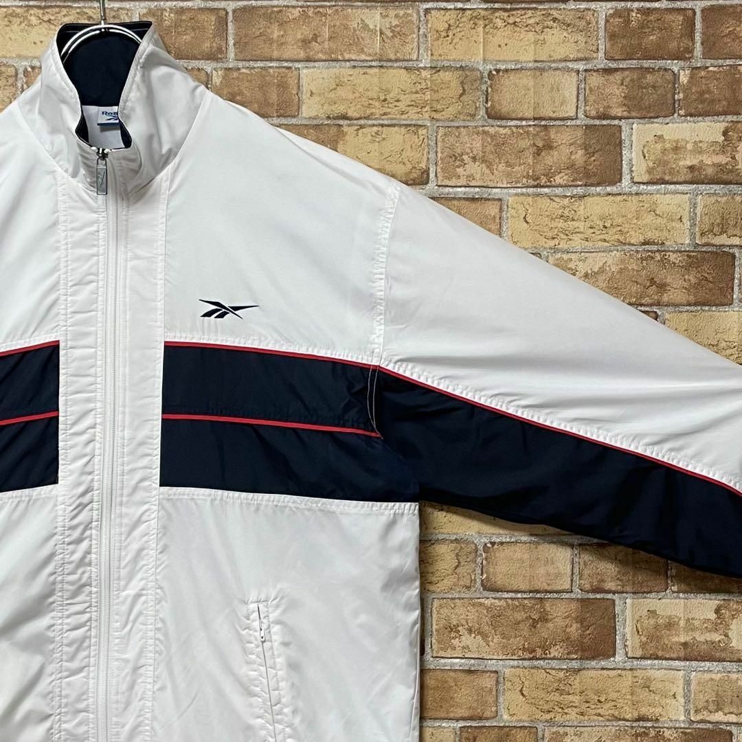 Reebok(リーボック)のリーボック　90s ナイロンジャケット　刺繍ロゴ　ビッグシルエット　白　L その他のその他(その他)の商品写真