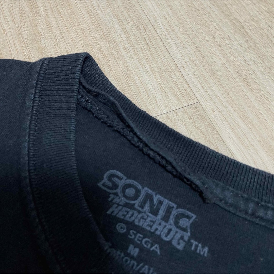 SEGA(セガ)のソニック　Tシャツ　M　ブラック　黒　キャラクター　ゲーム　SEGA　USA古着 メンズのトップス(Tシャツ/カットソー(半袖/袖なし))の商品写真